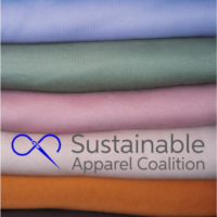 sustainable apparel coalition logo on pile of pastel fabrics